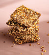 Premium Belgian dark chocolate almond praline with roasted almonds and salted caramel by Farmaan